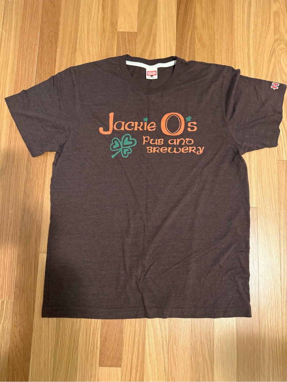 HOMAGE Brown Mens T-Shirt with Orange Logo and Green Shamrock
